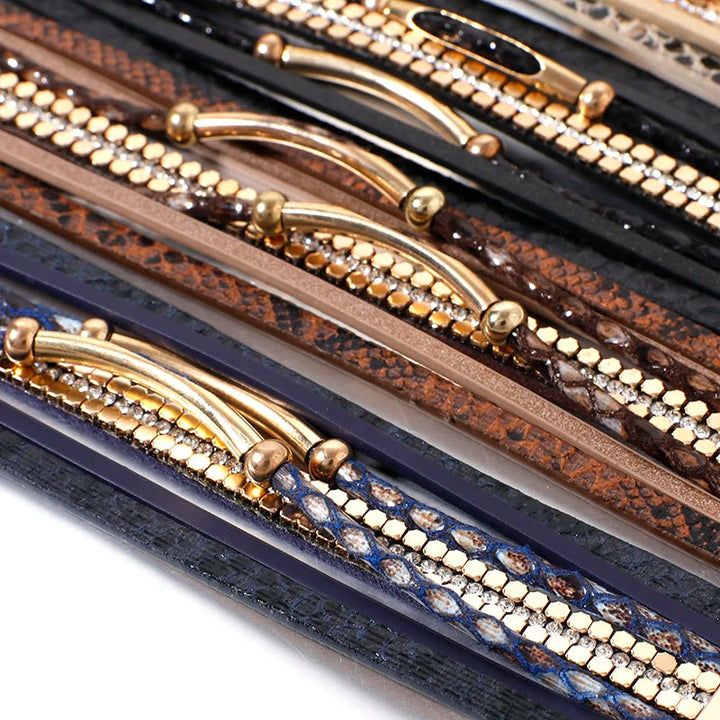 Fashionable layered snake leather bracelet, an elegant and sophisticated wristband for women's style.