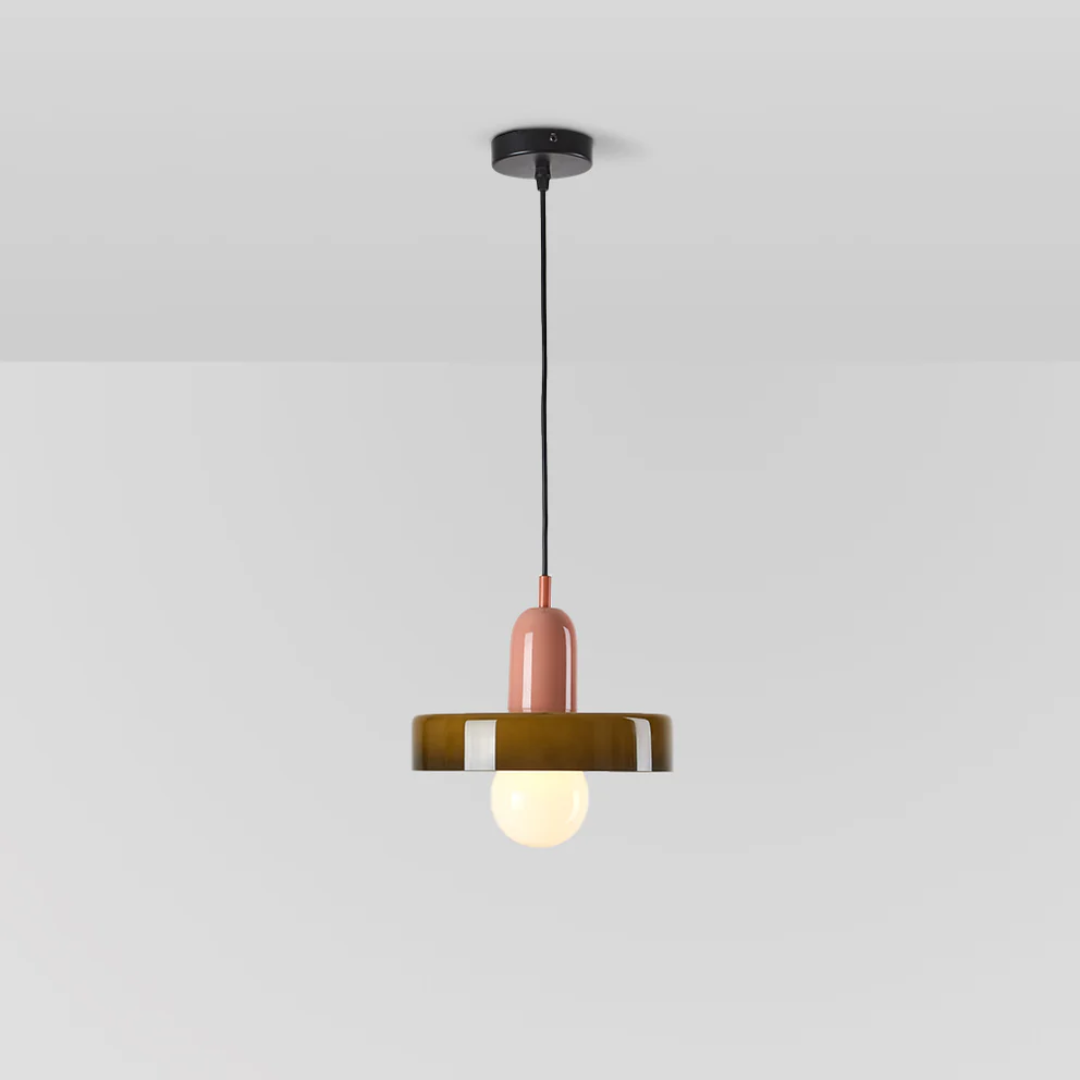 Clear glass globe LED pendant light, elegant ceiling fixture for living spaces.
