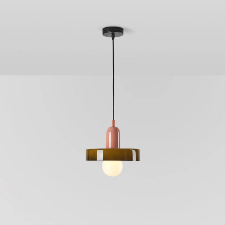 Clear glass globe LED pendant light, elegant ceiling fixture for living spaces.