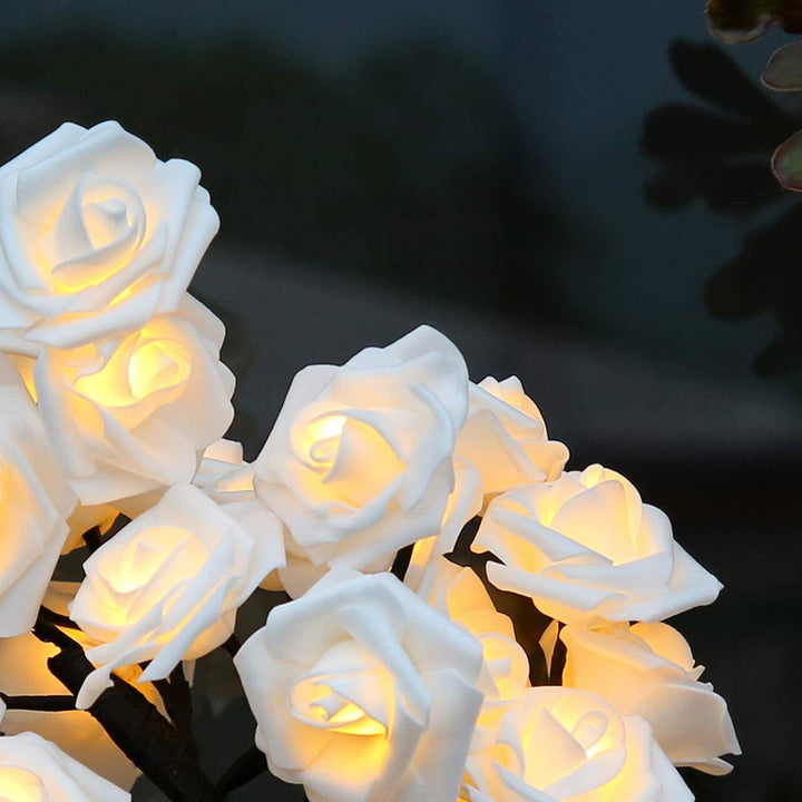 Decorative LED rose tree, soft warm light, suitable for bedroom, living room, or special occasions.