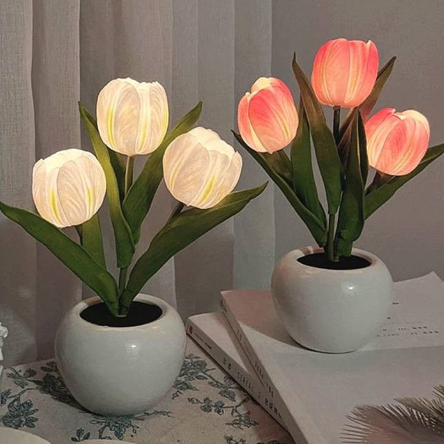 LumiTulip LED tulip night light, a stylish gift item casting warm light in a room.