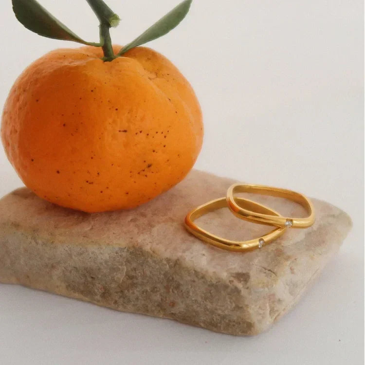 Minimalist Leona zirconia ring with sparkling stone, gold plated. Elegant women's jewelry, delicate for everyday.