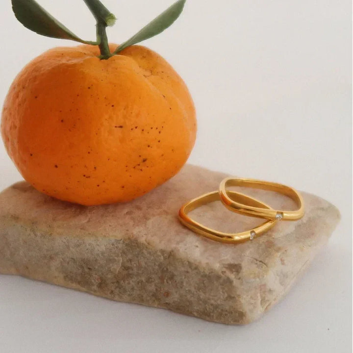 Minimalist Leona zirconia ring with sparkling stone, gold plated. Elegant women's jewelry, delicate for everyday.