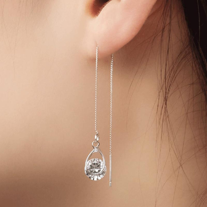 Elegant long drop rhinestone dangle earrings for women, sparkling fashion jewelry.