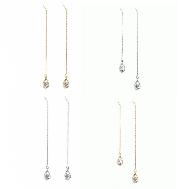 Luxury long drop rhinestone dangle earrings, a sparkling statement piece for elegant women.
