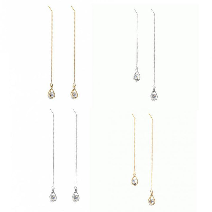 Luxury long drop rhinestone dangle earrings, a sparkling statement piece for elegant women.