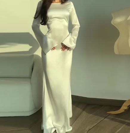 Elegant long sleeve summer dress for women, versatile for casual or party wear. Features a stylish, fitted design.