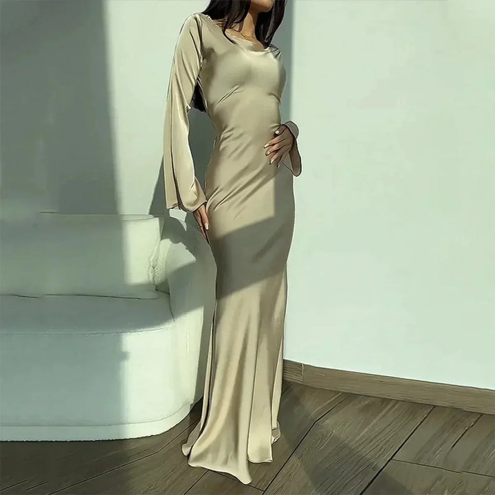 Versatile white women's long sleeve dress, elegant and fitted, suitable as a summer casual or party dress.