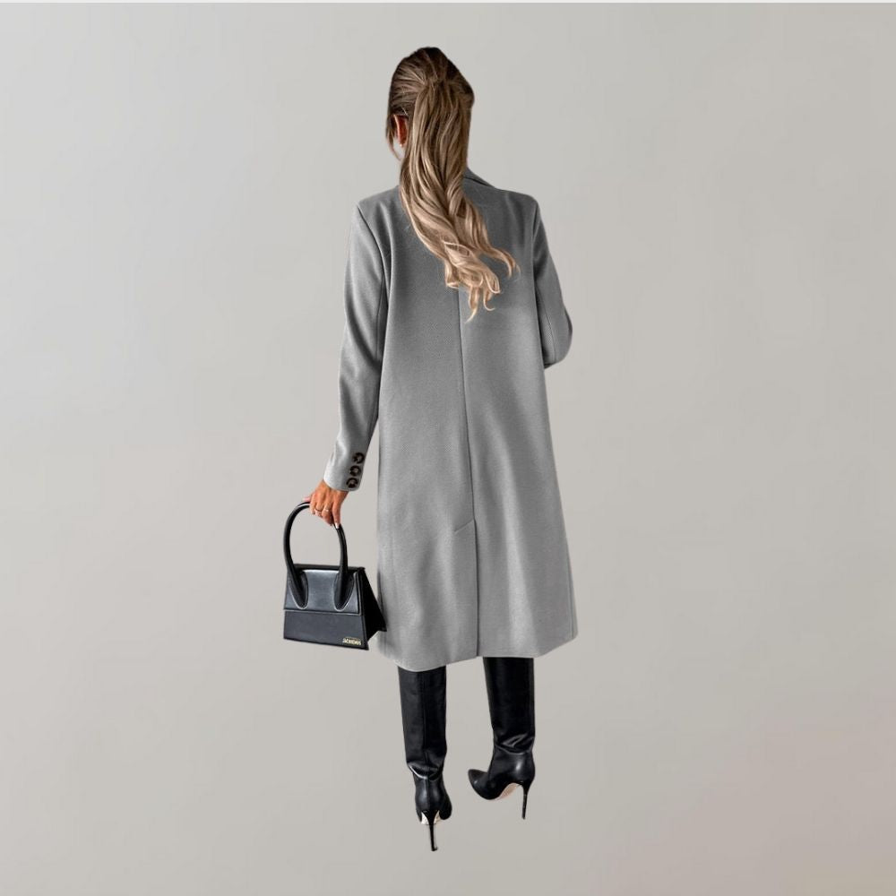 Stylish women's long winter coat, perfect for an elegant winter fashion look.