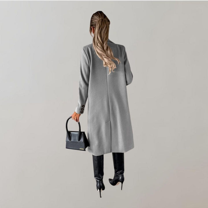 Stylish women's long winter coat, perfect for an elegant winter fashion look.