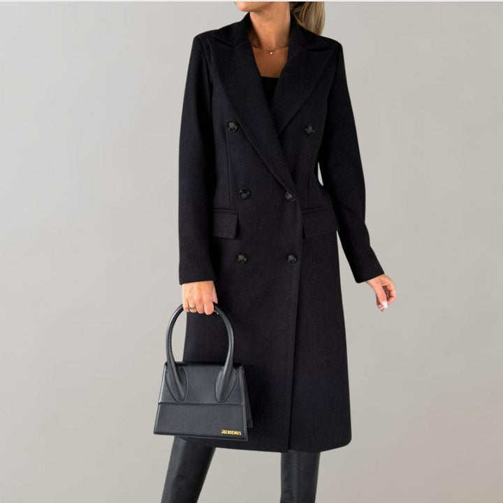 Women's elegant long winter coat, offering warmth and style for cold days.