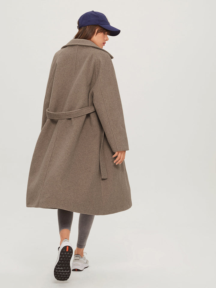 Cozy long women's winter coat, perfect for casual outings or holiday wear. Fashionable & warm ladies jacket outerwear.