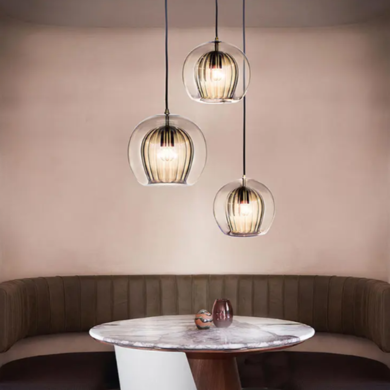 Create custom lighting with this modern adjustable pendant lamp, aluminum-glass elegance.