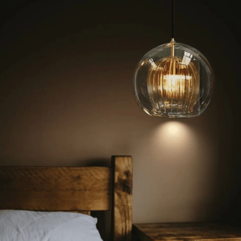 Living room adjustable ceiling fixture, modern aluminum & glass pendant lamp for stylish homes.