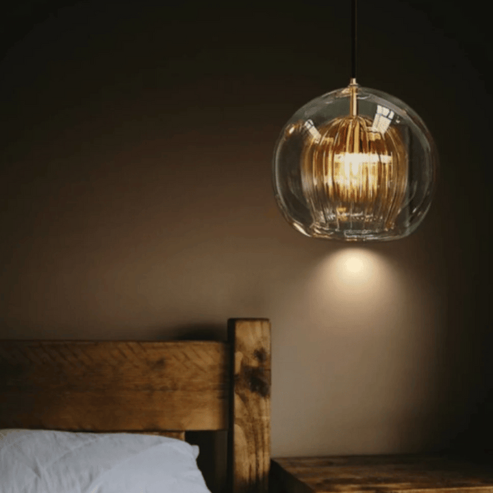 Living room adjustable ceiling fixture, modern aluminum & glass pendant lamp for stylish homes.