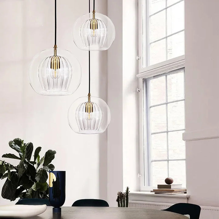Dining room designer pendant lamp, adjustable LED light, LumaLite modern aluminum-glass style.