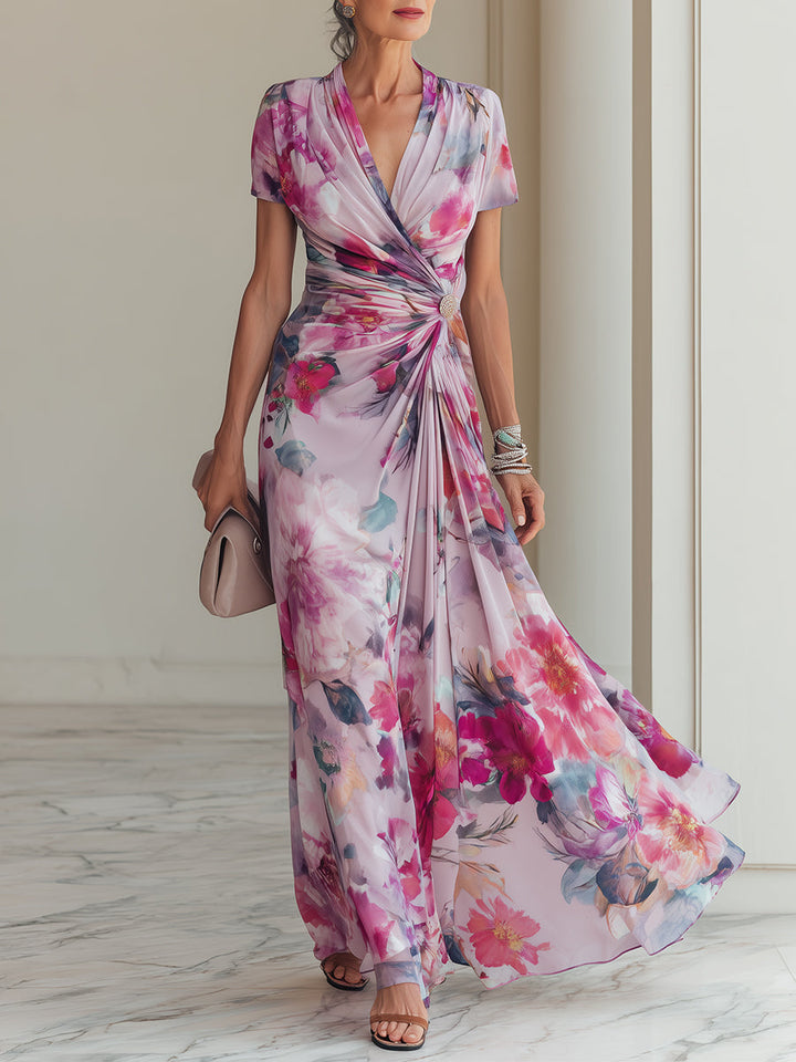 Elegant magenta floral maxi dress for women, featuring a V-neck, short sleeves & a stylish ruched waist. Perfect for weddings.