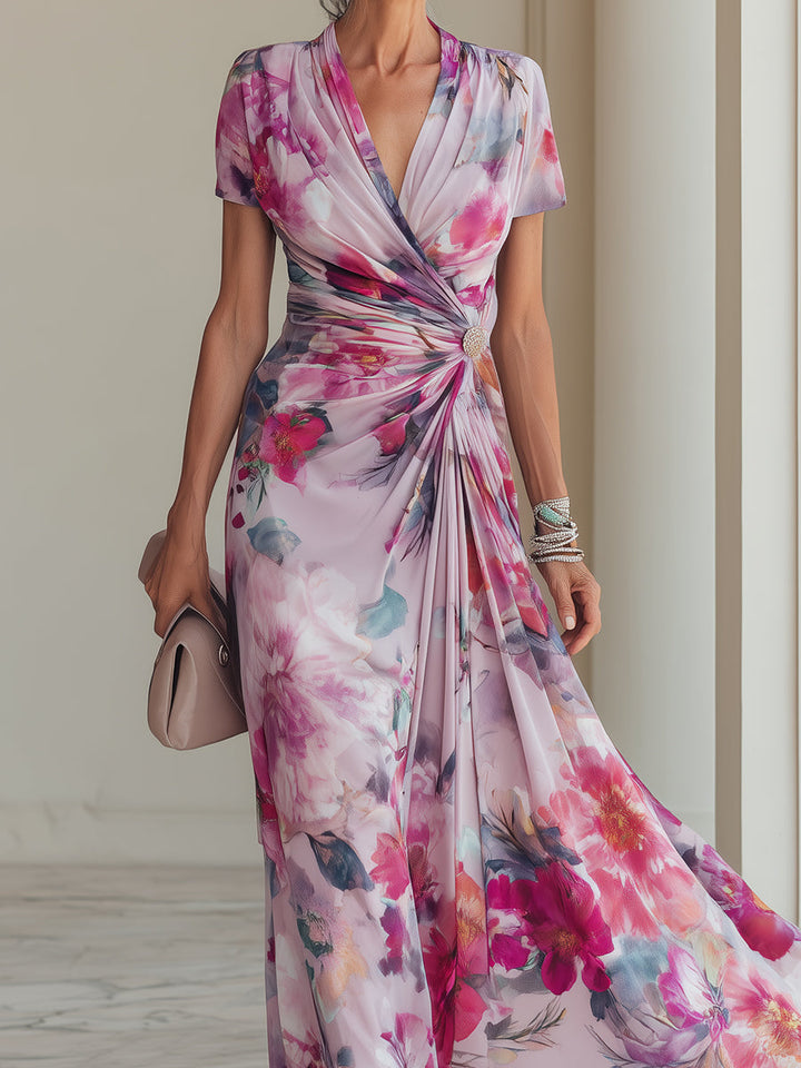 Women's formal magenta floral V-neck maxi dress with short sleeves & ruched waist. Ideal for evening & special occasions.