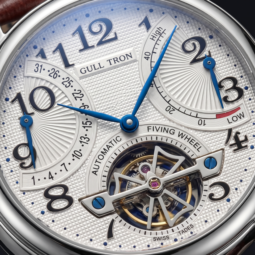 Close-up of an elegant men's automatic watch face, highlighting the intricate hands and precise markers.