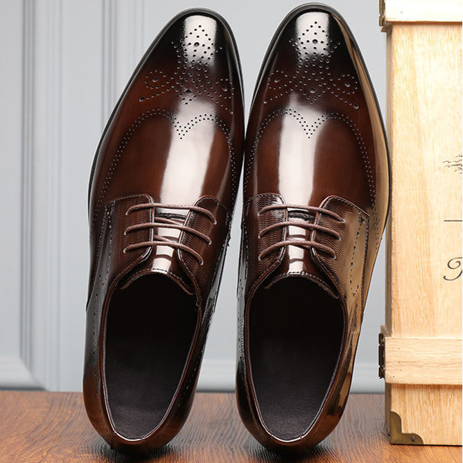 Professional black brogue men's shoes, ideal for business meetings, office wear, and elegant formal events.