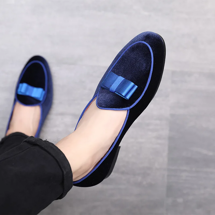 Sophisticated men's leather Sovereign loafers, sleek slip-on formal shoes for a polished and elegant evening wear look.