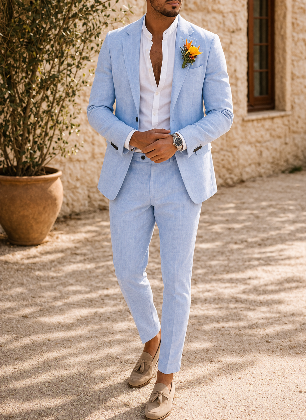 Stylish men's tailored two-piece suit with a modern fit, ideal for a wedding or special occasion formal wear.