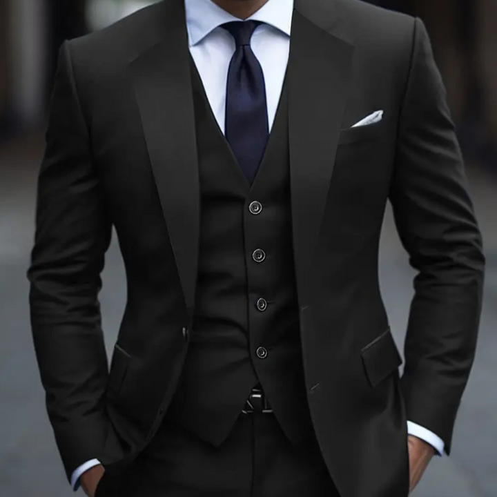 Dark blue men's three-piece suit, slim fit formal wear for weddings, business, and special occasions. Tailored design.
