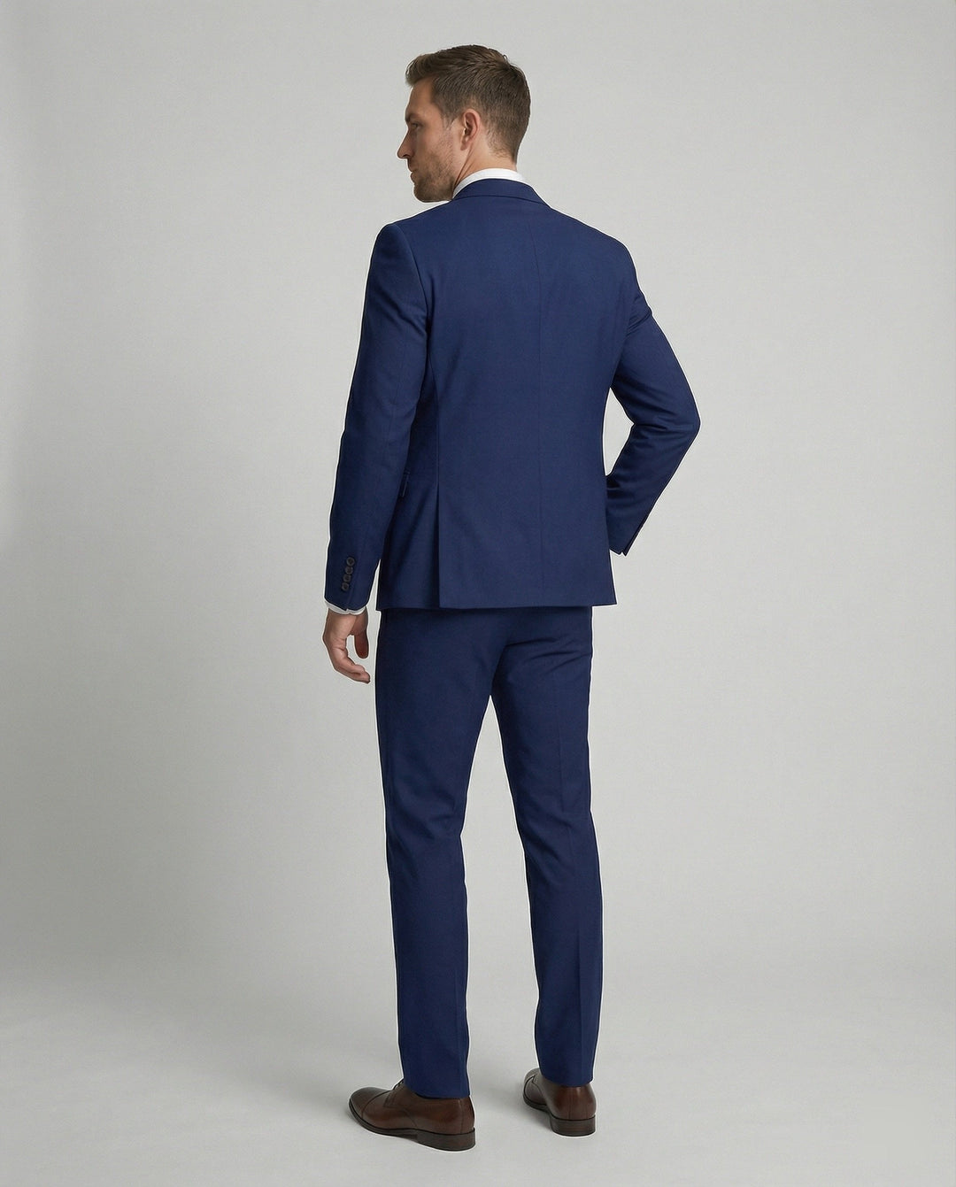 Classic tailored men's business suit set with jacket, vest & trousers; ideal formal occasion wear.