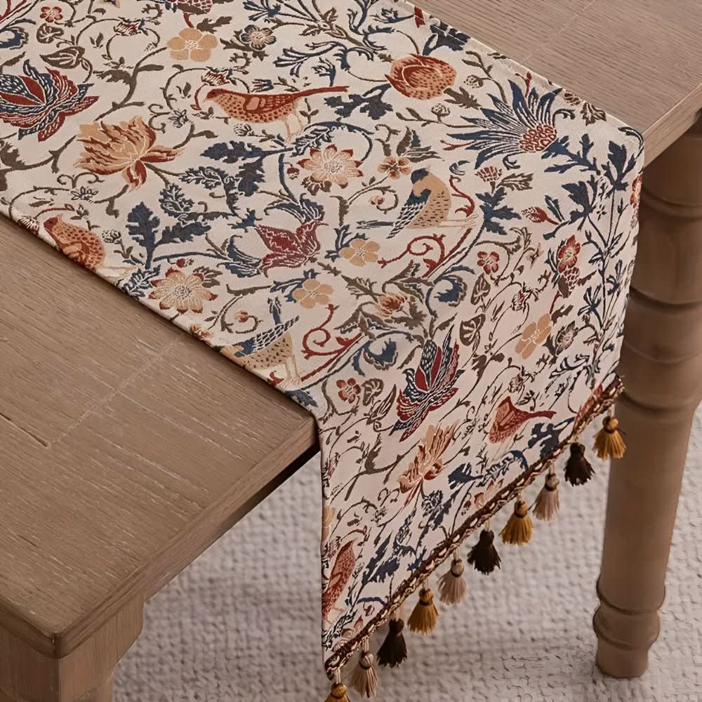 Decorative table linen: elegant floral bird motif table runner, perfect for vintage or country-themed dining.