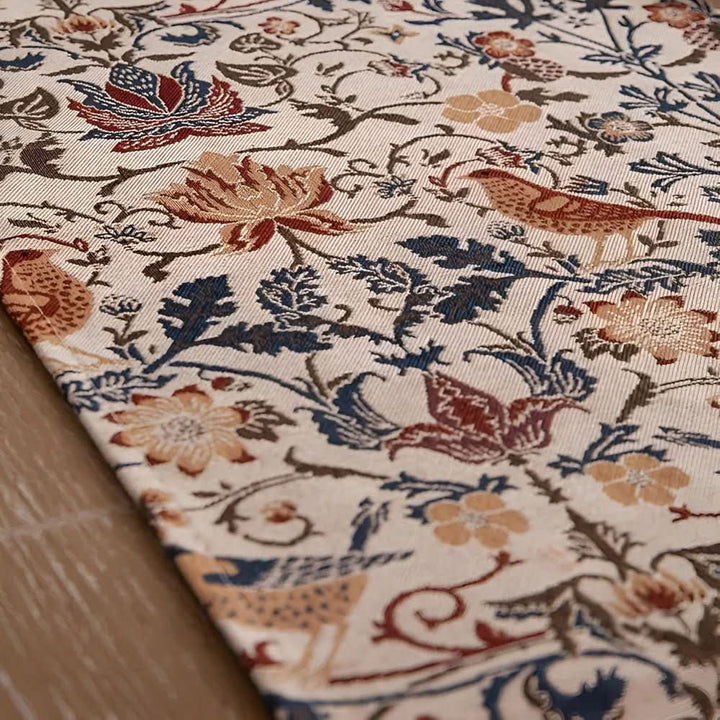 Jacquard table runner, featuring an exquisite floral and bird design, a sophisticated home accent for dining.