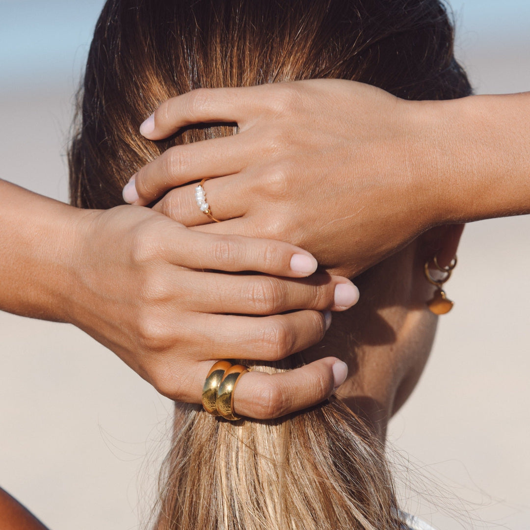 Trendy mini pearl ring featuring multiple small freshwater pearls, a beautiful women's jewelry gift.