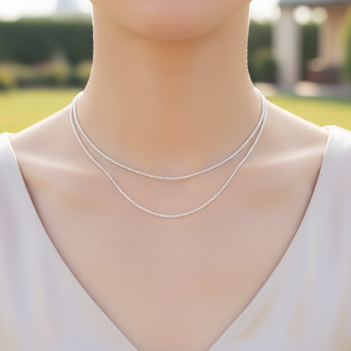 Elegant minimalist silver necklace for women, classic jewelry accessory.