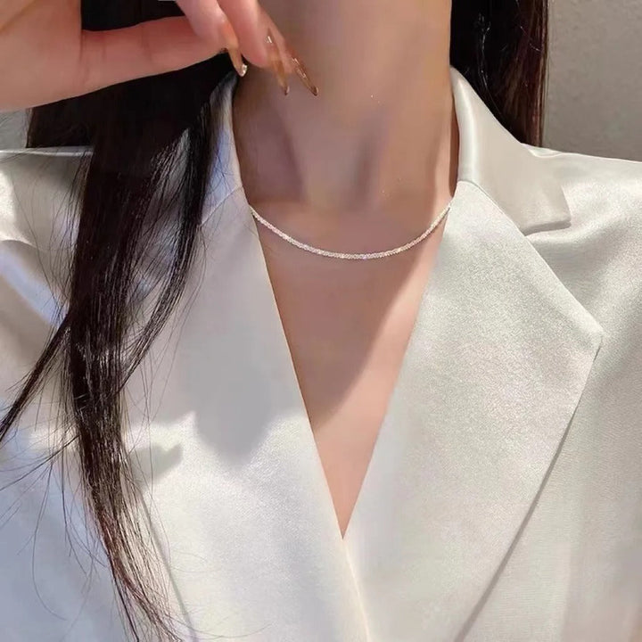 Delicate minimalist necklace, enhancing women's elegant style.