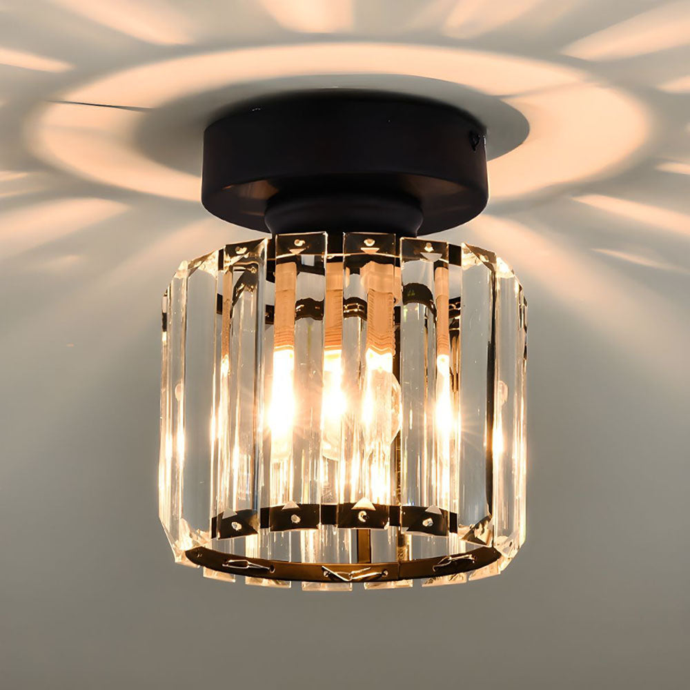 Elegant modern crystal ceiling light fixture with shimmering accents, perfect for home decor.