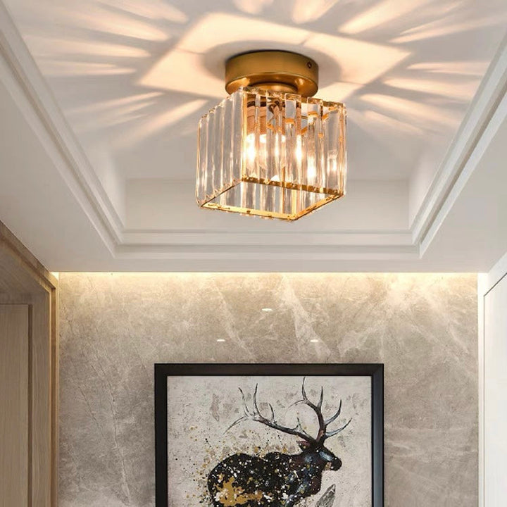 Modern crystal ceiling light fixture, elegant design with shimmering accents for contemporary homes.