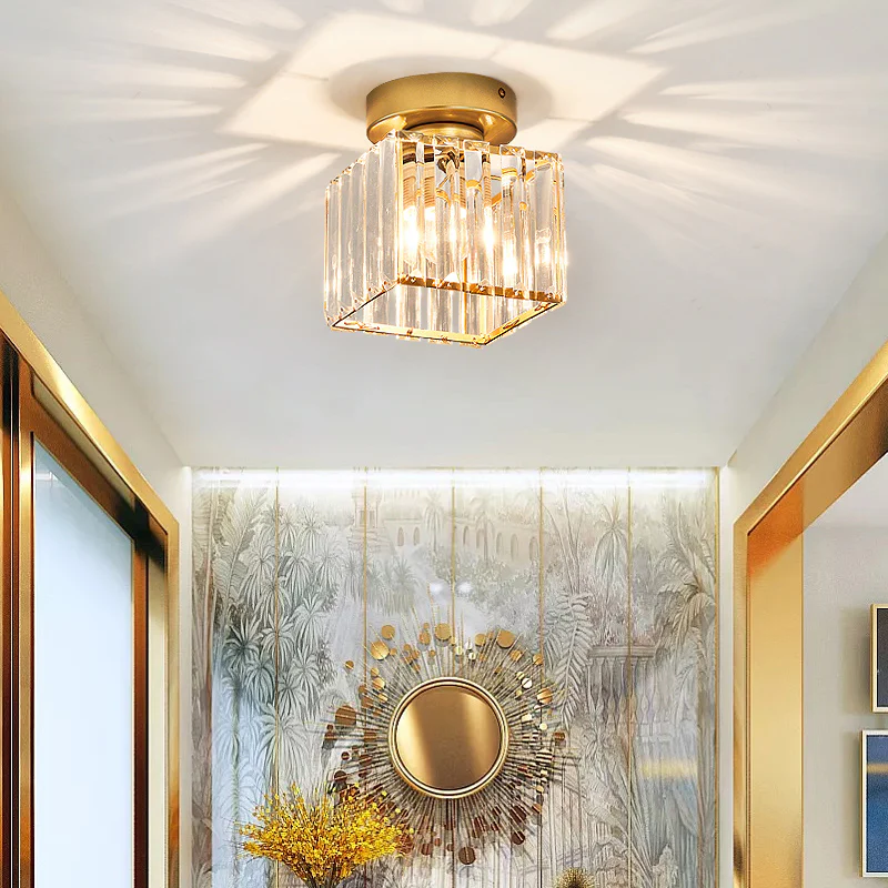 Round gold modern crystal ceiling light, an elegant flush mount fixture with shimmering accents.