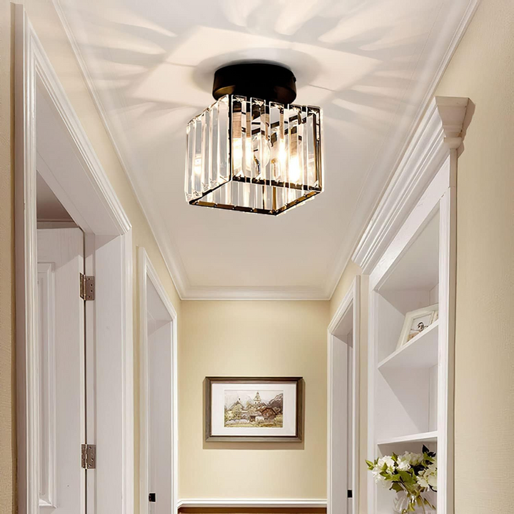 Gold modern crystal ceiling light fixture for living room, offering elegant shimmering illumination.