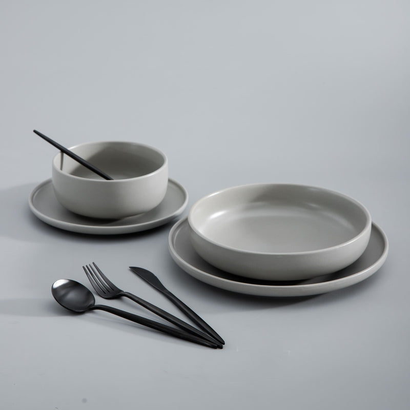 Modern flatware set with minimalist design, complementing contemporary dinnerware.