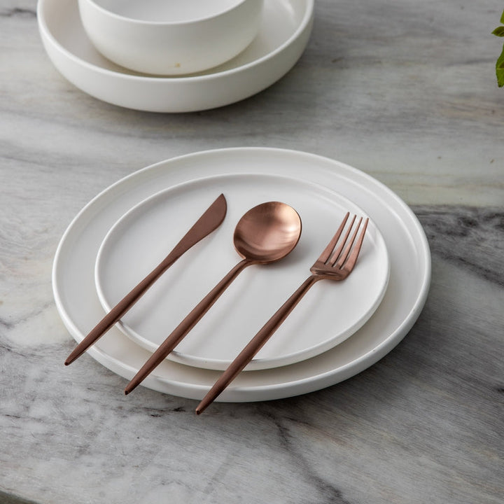 Stylish matte flatware set, minimalist design for elegant modern tables.