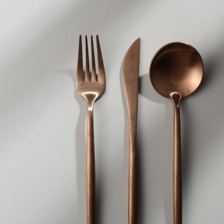 Hostess gift idea: modern minimalist flatware set with a refined matte finish.