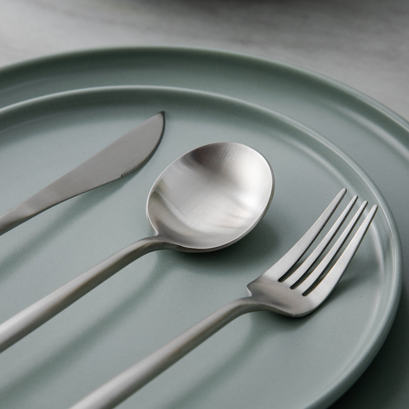Sleek matte minimalist flatware set, a versatile kitchen essential.