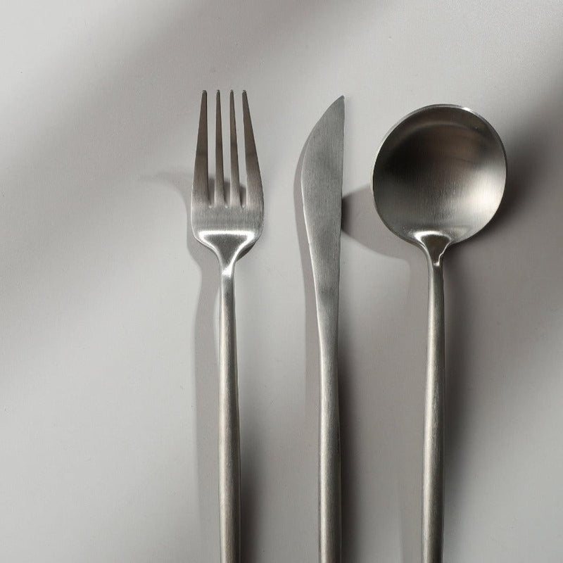 Elegant flatware set, modern minimalist design perfect for any dining style.