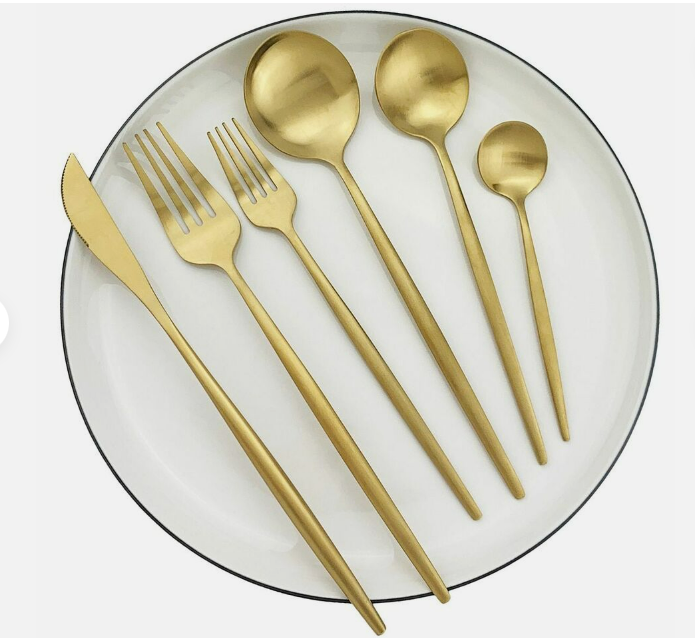 Chic minimalist flatware set for modern dining, a great home decor accent.