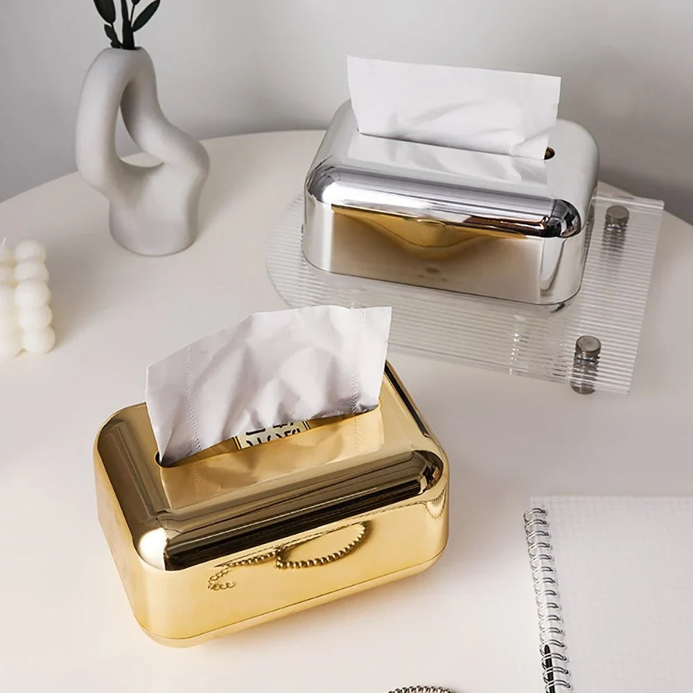 Luxury gold finish tissue box holder, a modern bathroom accessory.
