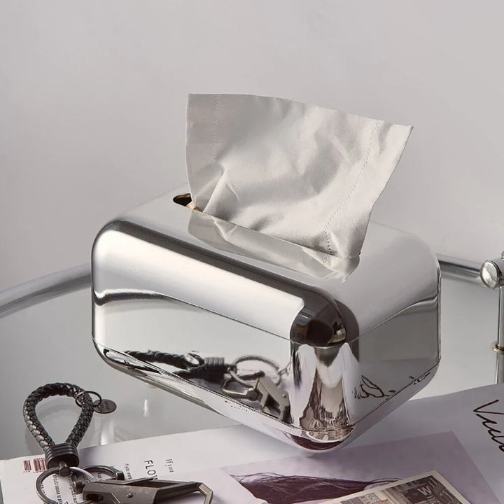 Modern silver finish tissue box holder, an elegant tabletop organizer.
