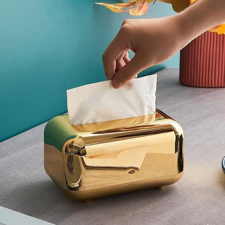 Stylish modern gold tissue box holder, enhancing home decor with luxury.