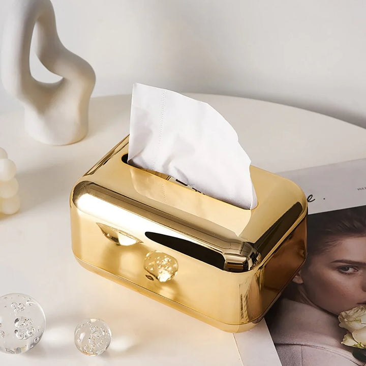Modern gold finish tissue box holder, sleek style for elegant home decor.