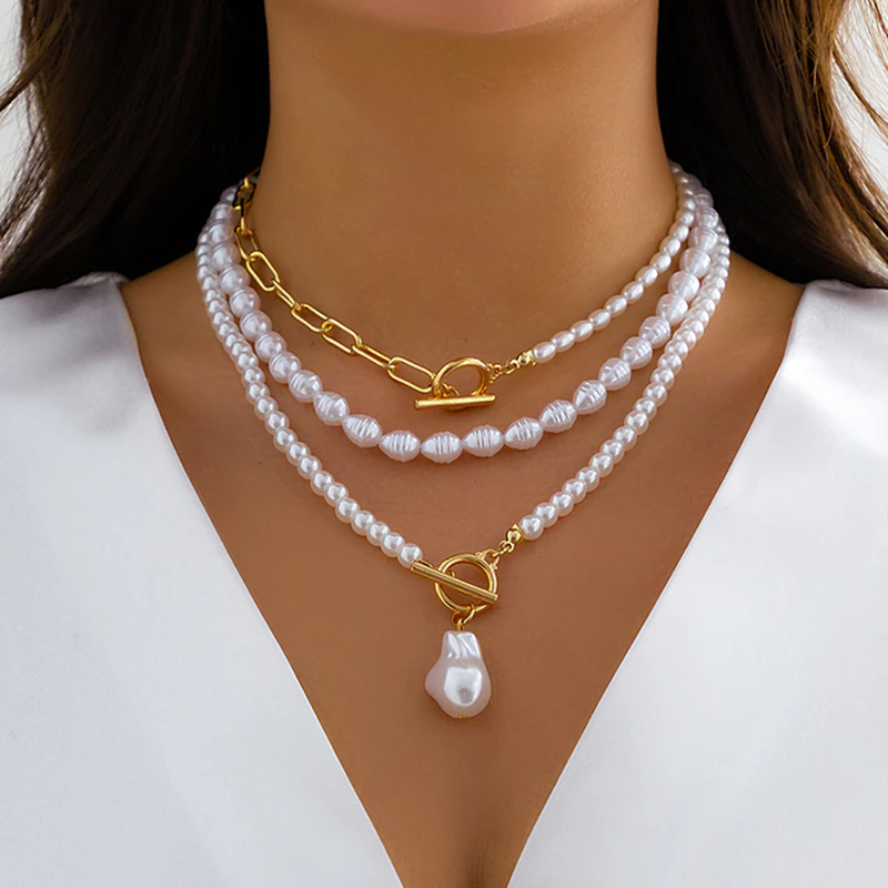Classic multi-layer pearl necklace, an elegant fashion jewelry statement with lustrous pearls.