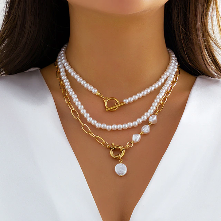 Detail shot of multi-layer pearl necklace showing adjustable length and secure lobster clasp.