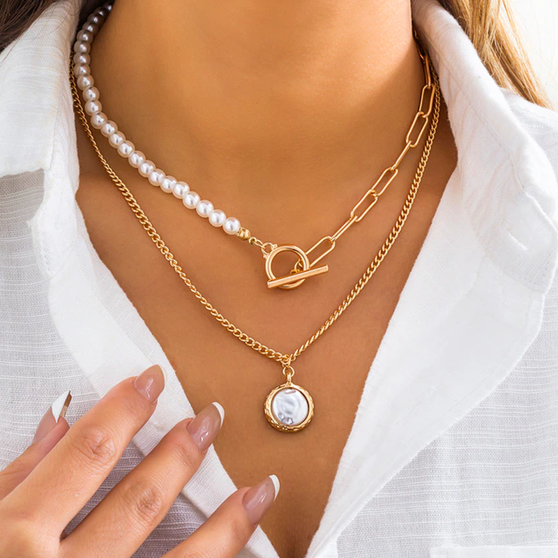 Glamorous multi-layer pearl necklace, a striking statement piece with adjustable fit.